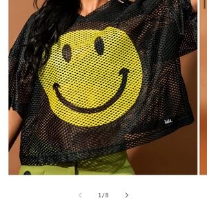 Dressed  in Lala Smiley Face Jersey 😊